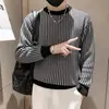 Suéter de punto grueso de cuello redondo nuevo para hombre de Primavera y Otoño, suéter a cuadros versátil, de manga larga ajustado, moda
