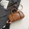 Bolso de mano de piel con cera de aceite para mujer, moderno, otoño e invierno 2024, de alta gama, sencillo, tipo bandolera.