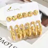 6 pares de aretes de traje estilo europeo y americano dorados retro en forma de C personalidad exagerada geométricos en forma de corazón redondos de retención de color venta al por mayor