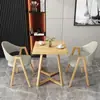 Mesa y sillas de reunión de estilo nórdico, moda italiana, lujo ligero; mesa de recepción y negociación de negocios de alta gama, mesa de ocio para patio
