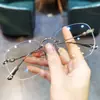 Nuevas Monturas para Gafas con Forma de Corazón Jian Dan Luo para Hombres y Mujeres, Montura de Titanio Moderna, Ultraligera, Sin Marco, Marco Perforado, Se Pueden Montar Lentes Graduados y Protección contra Luz Azul