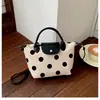 Bolsa de poá estilo coreano, bolsa de ombro de luxo de nicho, moda outono e inverno 2026, elegante bolsa de ombro e axila transfronteiriça para o dia a dia