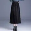 Falda de encaje flocado con dobladillo grande para mujer, nuevo estilo otoño e invierno 2026, de cintura alta, adelgazante, de longitud media, elegante, falda lisa y plisada
