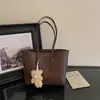 Estilo europeo y americano, textura tejida, ligero, lujoso, retro, casual y adecuado para ir al trabajo; Bolsa de hombro tipo tote para mujer 2026 de gran capacidad, minimalista, con acentos decorativos