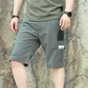 Calções Táticos Masculinos de Bolso Múltiplo Verão 2026, Esportivos e Casuais, Corte Solto, Roupa de Trabalho Fresca, Atacado
