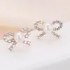 Brincos de laço populares com diamantes totais europeus e americanos, brincos de ouro coreanos de cobre puro, brincos femininos multicamadas da moda