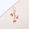 Chaveiro de Flor Colorida Europeu e Americano Transfronteiriço Simples e Fofo com Strass, Acessório para Bolsa de Estudante, Decoração de Carro