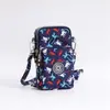 Bolsa diagonal para teléfono móvil al por mayor Nueva Bolsa pequeña para mujer Bolsa de tela para teléfono móvil bolsa vertical para cuello brazo muñeca monedero