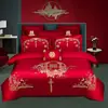 Juego de ropa de cama de lujo estilo chino, hecho de algodón 100% de fibra larga, un juego de cuatro piezas que incluye una sábana y una funda de edredón de algodón puro rojo, perfecto para la alcoba de una recién casada.