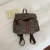 Mochila estampada de leopardo, bolsa estilo coreano, novo modelo 2026, adequada para todas as estações, mochila escolar de lona nicho, mochila casual de alta estética
