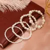 Pulsera de Perlas de Moda Europea y Americana Transfronteriza Traje de Pulsera de Mano de 4 Piezas con Temperamento de Nicho Joyería de Adorno para Mujeres