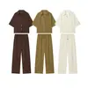 Ropa de mujer al por mayor transfronteriza estilo europeo y americano 2026 primavera nuevo conjunto de camisa de color liso holgada + pantalones casuales rectos