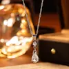 Collar para Mujer Estilo Europeo y Americano Gota de Agua Zirconia Conjunto de Collar y Aretes 2026 Nuevo Diseño de Nicho Elegante Colgante de Collar para Mujer