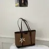 Bolso de mezclilla transfronterizo de gran capacidad para mujer, nuevo modelo de verano 2026, bolso de hombro simple y elegante para el trabajo y los desplazamientos, bolso tote