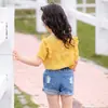 Ropa de Verano para Niños 2025 Blusa para Niñas Estilo Coreano con Borde de Volantes Tops de Manga Corta de Moda para Niñas Venta al por Mayor desde Fabricante