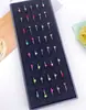 Suministro de Joyería de Comercio Exterior Transfronterizo Europeo y Americano: 60 Cajas de Tachuelas para Nariz de Acero Inoxidable de 2 mm para Piercings Faciales y Corporales