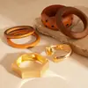 Pulsera Geométric Simple de Madera con Remaches de Estrella Transfronteriza Europea y Americana Lujo Ligero Pulsera de Gama Alta Pulsera de Moda Exagerada para Mujeres