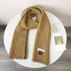 Bufanda cálida de otoño e invierno Dongdaemun Corea del Sur Bufanda tejida dulce japonesa etiqueta de tela para mujer Bufanda de lana lisa combinable