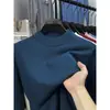 Suéter de cuello alto cruzado al por mayor para hombre, nuevo estilo otoño e invierno 2026, camiseta básica de punto versátil de color liso para hombres de mediana edad