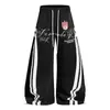 Fabricante Original High Street Americano Retro Estampado Rayado Marca de Moda Cool Estilo Urbano Holgados Pierna Ancha Casual Pantalones Deportivos para Hombre Verano