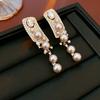 Pendientes de perlas artificiales con incrustaciones de diamantes y aguja de plata, estilo palaciego de lujo, retro y accesible, versátiles y exquisitos para mujer.
