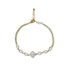 Lujo Ligero, Exquisito, Moderno y Versátil Pulsera de Flor de Cuatro Hojas Micro-Pavimentada con Circonita, Pulsera Súper Brillante Femenina para el Viaje Diario al Trabajo al por Mayor