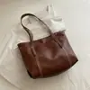 Bolso de gran capacidad estilo europeo y americano 2026, bolso de hombro estilo universitario para mujer, bolso tote de cuero suave para commuting, bolso tote de moda para mujer