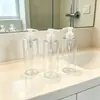 Botella de hombro plano de 60 ml, 24 unidades, transparente, de PET, de pequeña capacidad, para uso diario, gel de ducha, champú y viaje, venta directa de fábrica