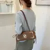 Bolsa de tela bordada simple y retro, nueva colección otoño/invierno 2026 para mujer, bolso de hombro niche para el día a día, bolso versátil para el antebrazo