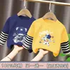 Camiseta de manga larga con retazos a rayas para niños, primavera y otoño, algodón puro, estilo coreano, holgada y elegante, camiseta básica con estampado de dibujos animados para niños