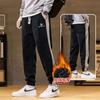 Pantalones deportivos casuales para hombre holgados talla grande Primavera y Otoño 2024 Nuevo Combinación de colores a rayas Juventud Casual Pierna Pantalones que combinan con todo