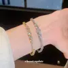 Set de Pulsera con Anillo Redondo de Circonita Chapado en Oro de 18 Quilates Pulsera de Lujo Ligero con Acabado de Alta Gama Joyería para Manos para el Trabajo y Eventos Muestra Temperamento