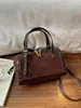 Bolsa Boston de Camurça Retrô Feminina 2026 Outono Novo Estilo Textura de Alta Qualidade Bolsa de Mão Bolsa de Ombro