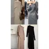 Estilo de lujo ligero, conjunto de top de punto asimétrico sin hombros y falda de punto de cintura elástica, un sofisticado conjunto de dos piezas de suéter