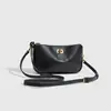 Bolso de axila vintage texturizado para mujer para primavera y verano, con cierre de candado, diseño cuadrado pequeño y una sensación de lujo ligera de alta gama. Se puede llevar como bolso de mano, bolso de hombro o bolso cruzado, y tiene el estilo de un bolso baguette.