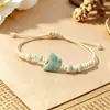 Pulsera trenzada de cordón de cera con mariposa de cerámica, simple y versátil, pulsera de hilo con cuentas de cerámica, joyería transfronteriza para parejas y mejores amigos