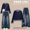 Cardigã longo de manga comprida em estilo coreano, artístico, moderno e doce com laço, combinado com calça jeans de modelagem solta - um conjunto de duas peças para meninas, perfeito para a primavera e o outono