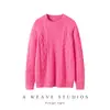 Novo estilo de suéter de cashmere grosso, canelado, com mangas raglan, caimento solto e relaxado, gola redonda, apresentando padrão trançado.