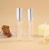 Venta Directa de Fábrica Botella de Vidrio Transparente para Perfume Atomizador de Aluminio Galvanizado Botella con Spray de Niebla Fina Botella para Trasvasar Perfume Muestra Portátil