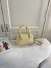 E-commerce transfronteiriço bolsa pequena estilosa de bolinhas feminina nova estilo coreano bolsa de mão ins bolsa Boston bolsa de ombro única transversal moderna