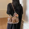 Bolso casual retro de gran capacidad, mochila de alta moda para mujer, novedad de otoño 2026, bolso de hombro y cruzado para el día a día