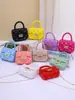 Bolsa de Gelatina para Niños 2026 Primavera/Verano Nuevo Bolso de Mano de Perlas Moderno Lindo Bolso de Hombro Único Cruzado Venta al por Mayor Concha Vacía