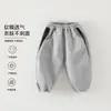 Suministro directo de fábrica de pantalones deportivos de dibujos animados de Clase A para niños y niñas, pantalones holgados de otoño, pantalones deportivos casuales suaves para niños pequeños