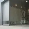 Puerta de Hangar Eléctrica de Giro Lateral, Puerta de Cristal Específica para Aeropuerto, Estructura Estable, Resistente al Viento, Puerta de Hierro Antirrobo, Puerta de Garaje