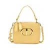 Bolso de cadena mini de moda al estilo Chanel, con costuras elegantes y un diseño cuadrado pequeño, perfecto como accesorio chic tanto para madres como para niños.