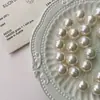Elegantes Pendientes de Clip Estilo Francés con Perlas Artificiales para Mujeres Sin Perforaciones, Diseño de Espiral para Mosquitos, Nicho de Alta Gama Nuevos Pendientes Otoño e Invierno 2026