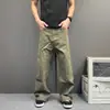 Pantalones de trabajo de lona resistente color caqui para hombre, con un estilo retro americano, construcción duradera, bolsillos laterales, un corte holgado, piernas anchas y un diseño casual largo.