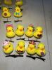 Venta al por mayor de lindas horquillas de pato amarillo con forma de corazón de melocotón, accesorios para el cabello de coche, tocados de pato, regalos para niñas estudiantes, juguetes pequeños