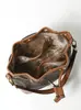 Bolsa de cubo de agua de suministro directo de comercio exterior, bolso de mano con cordón de bloqueo de color otoño e invierno para mujer, gran capacidad, versátil, para ir al trabajo, bolso de un solo hombro, se puede llevar cruzado