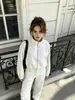 Exclusivo para ventas transfronterizas 2026 Chaqueta Corta de Cuello Alto para Mujer en Blanco Crudo con Puños Elásticos Abrigo Casual